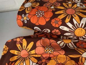 Bomuldsjersey - med fine retro blomster i varme orange toner